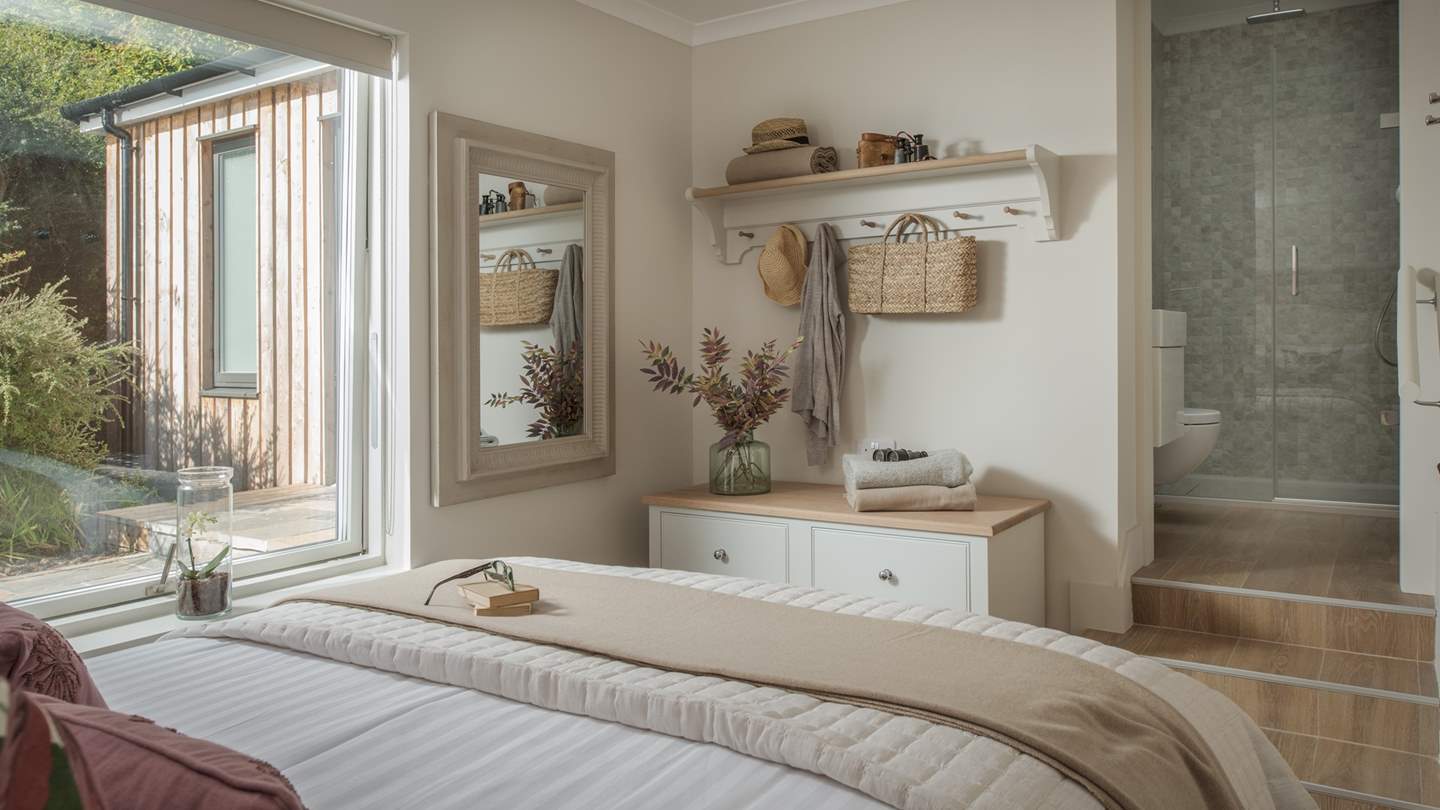 This bedroom is finished with its own ensuite shower room with underfloor heating.