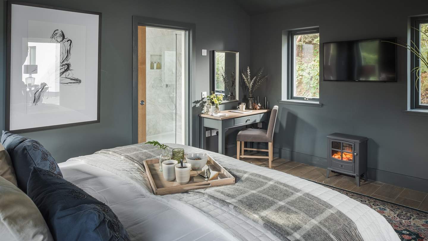 Separate from the main house, Tigh an Tobair's beautiful annexe enjoys an additional bedroom with a super king bed and an electric fireplace...