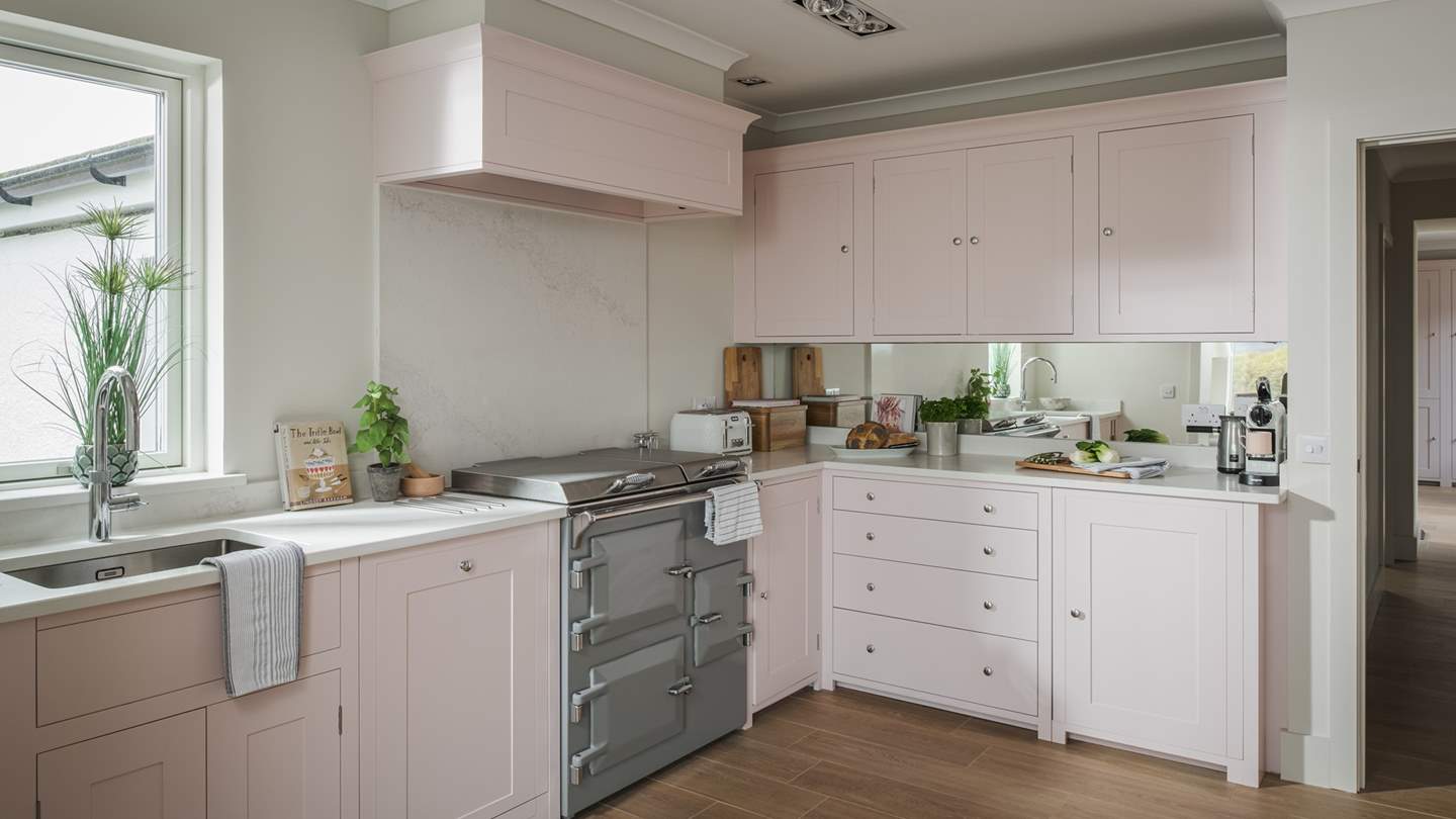 Ensuring you have everything you need, the well-equipped kitchen features an array of appliances and accoutrements...