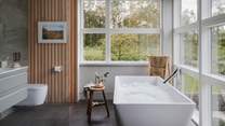 Savour sumptuous soaks in the freestanding bathtub, the perfect addition to the master ensuite 