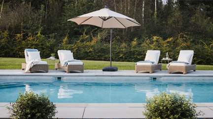 The pièce de resistance is the 10m heated pool, complete with four sun loungers and a large parasol