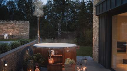 Soak up breath-taking vistas of star-studded skies from the electric wood-fired hot tub as the night draws in