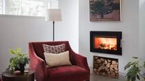 Savour evening tipples fireside in Prosper's sleek lounge 