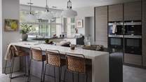 The expansive kitchen and dining space sets the scene for leisurely gatherings 