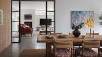 Stylish Crittall-style doors lead to the vast kitchen and dining space 