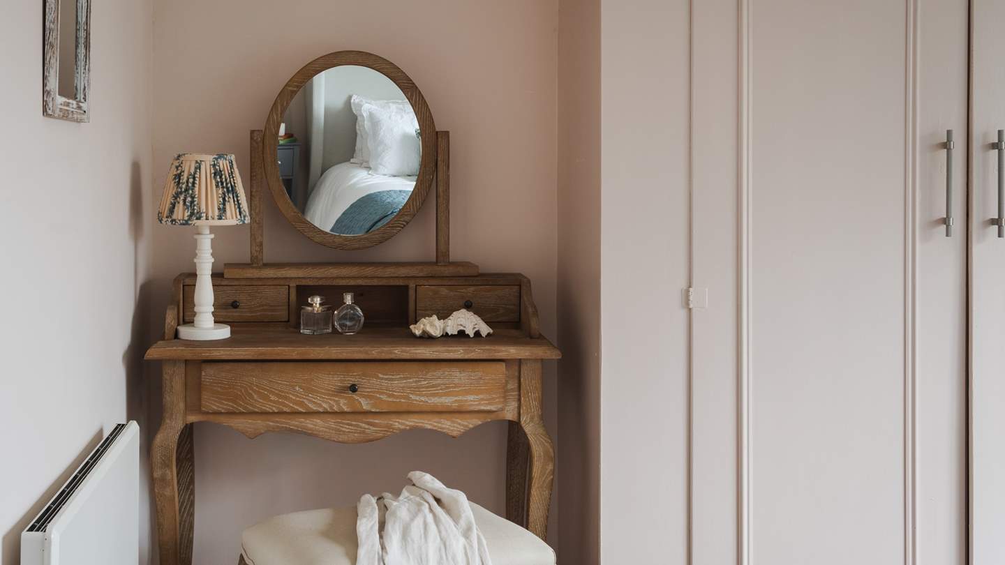 Seek tranquil repose within this soothing sanctuary, basking in calming tones and the ever-changing scenery beyond the window frame