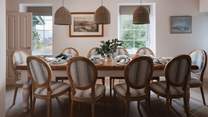 Next door is a dining room with stunning loch and mountain views