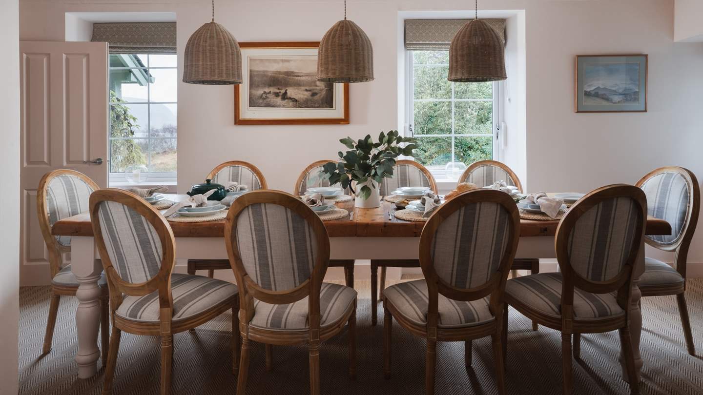 Next door is a dining room with stunning loch and mountain views