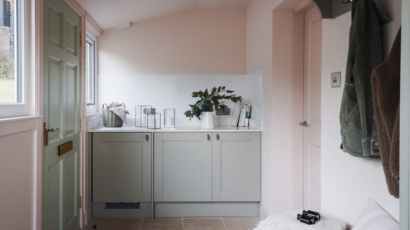 You will also find a handy utility space next door to the kitchen