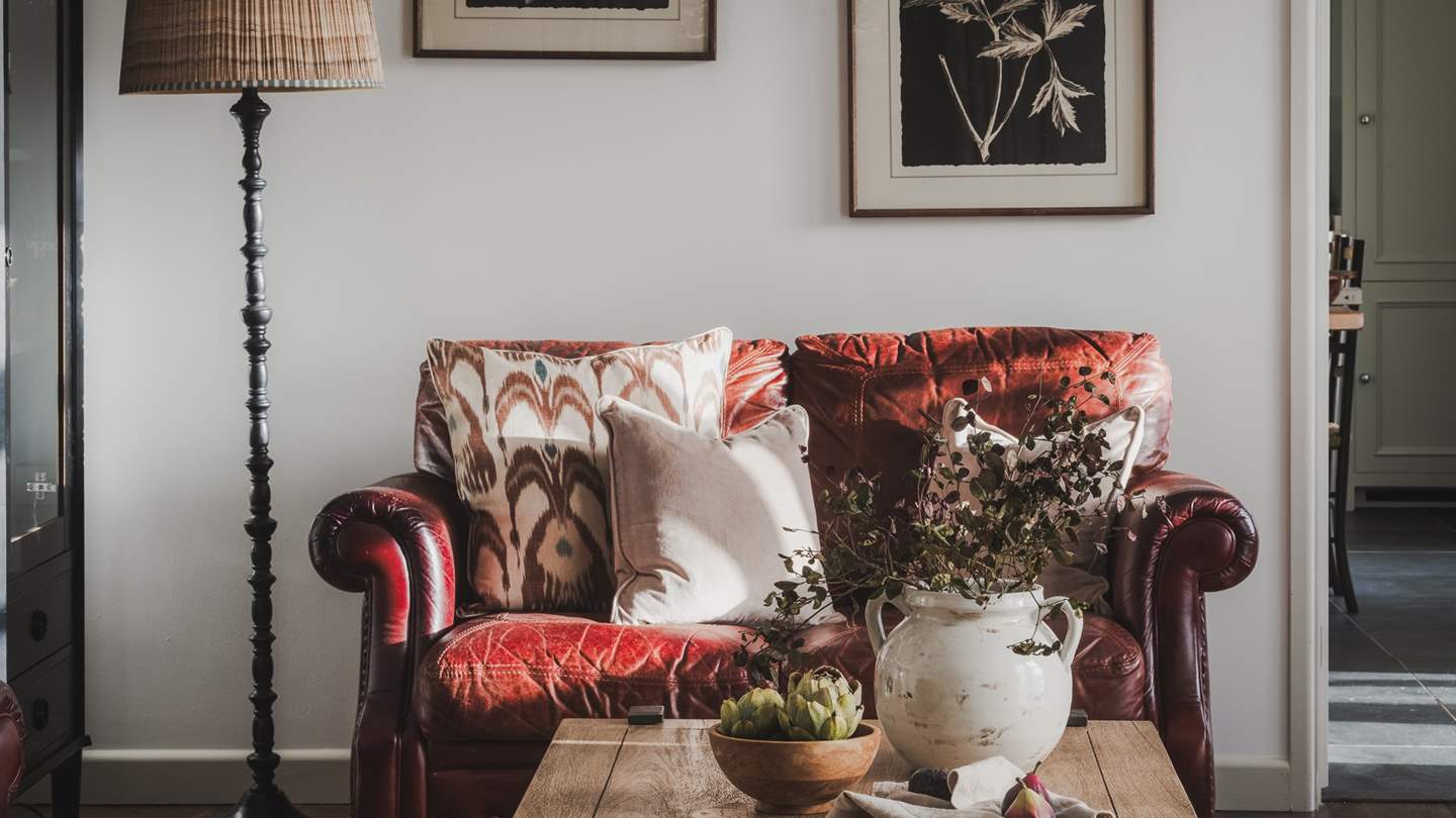 For fireside tipples, a drinks cabinet is stocked with a complimentary selection of Cornish gins