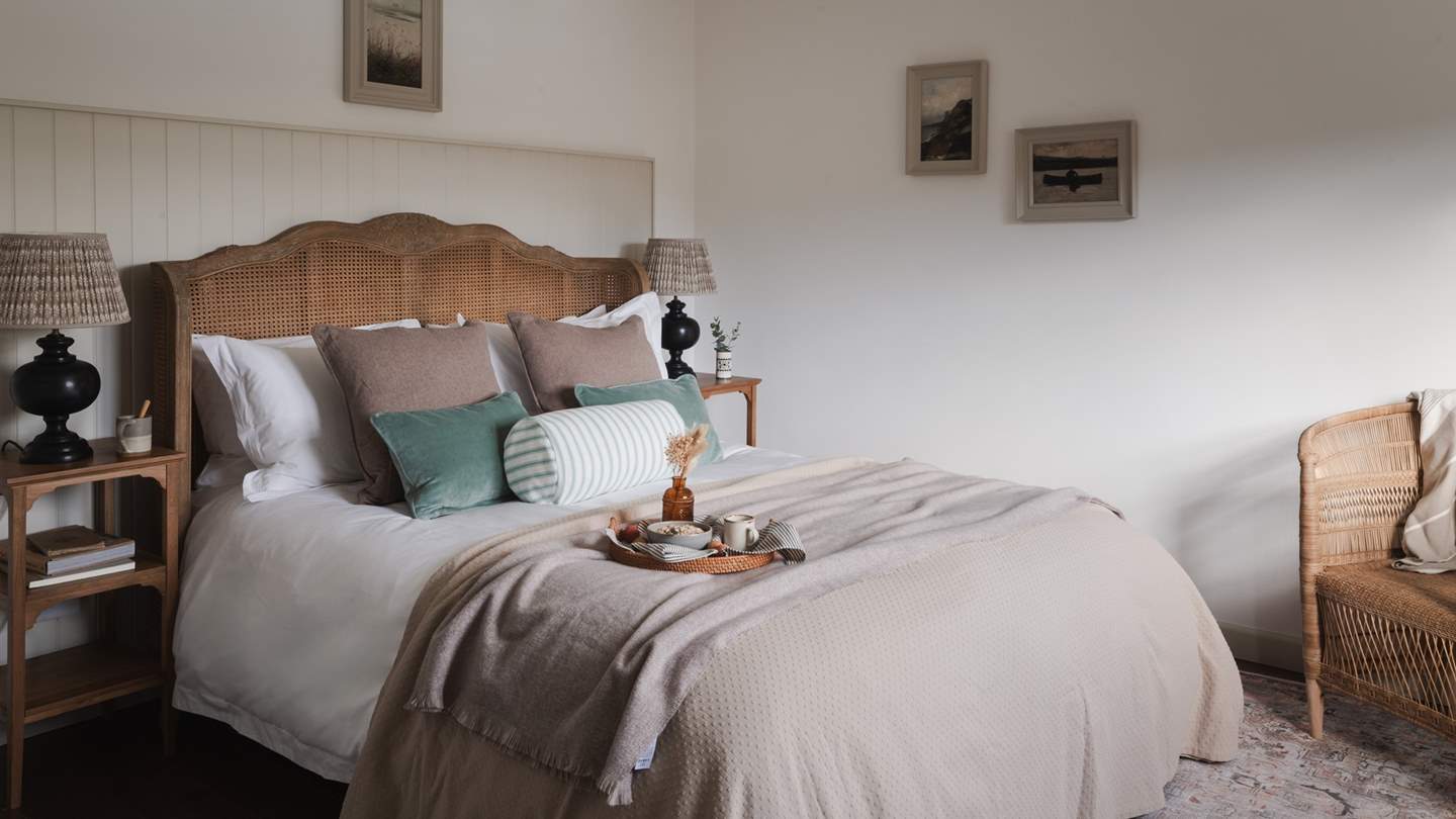 Wake up to coral-coloured sunrises dancing off the water...