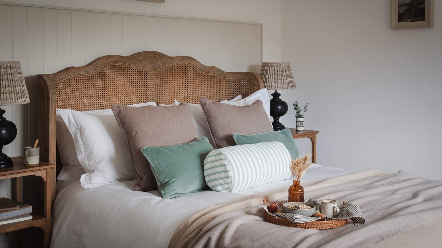 A tranquil space for restful slumber, it features calming hues and abundant natural light