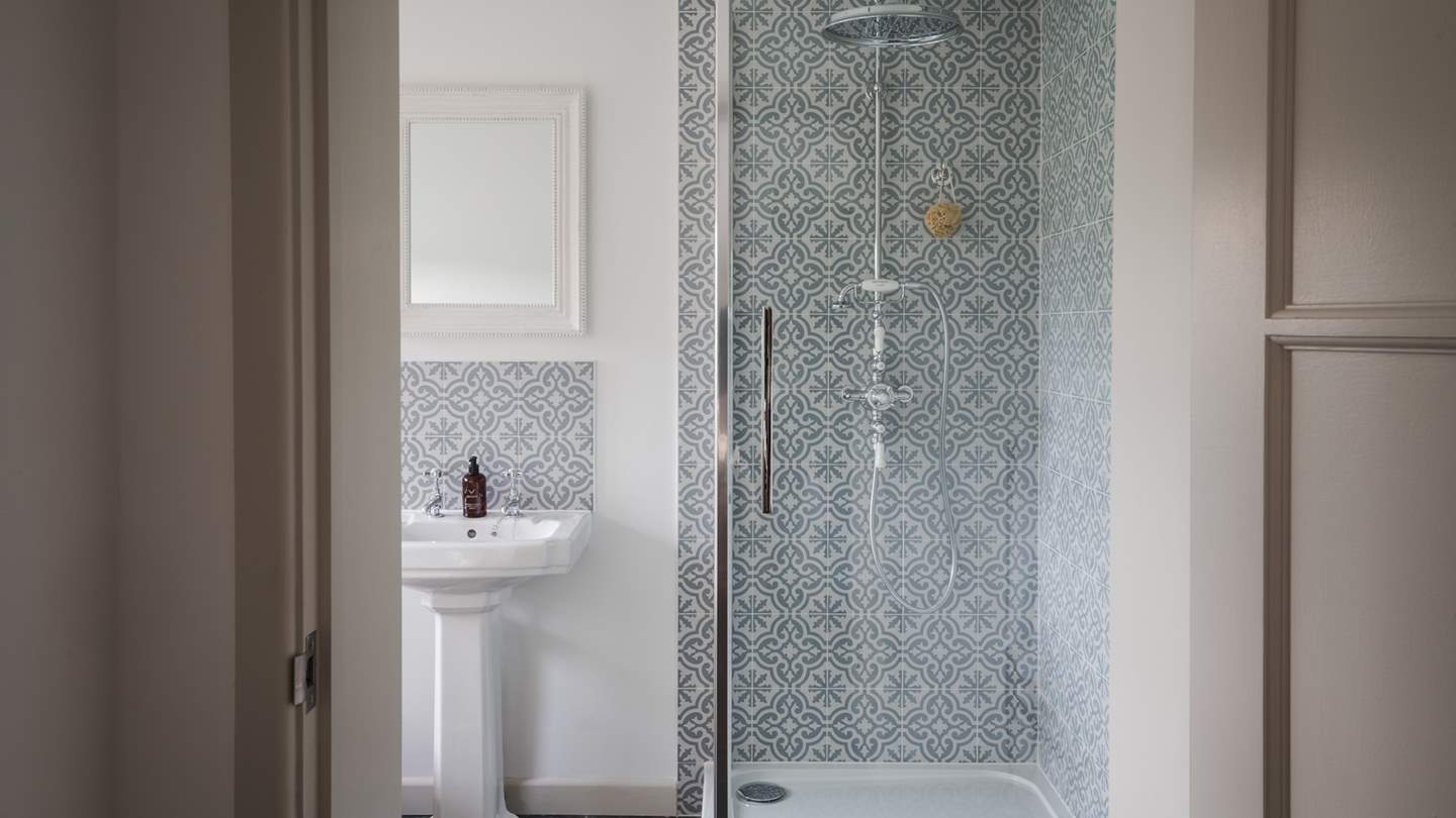 Decorated with blue and white Moroccan-inspired tiles