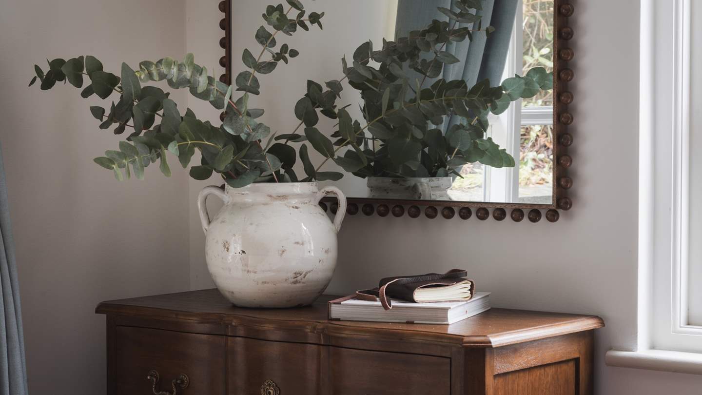 Relaxing tones and tasteful artwork nod to hazy summers and tranquil climes