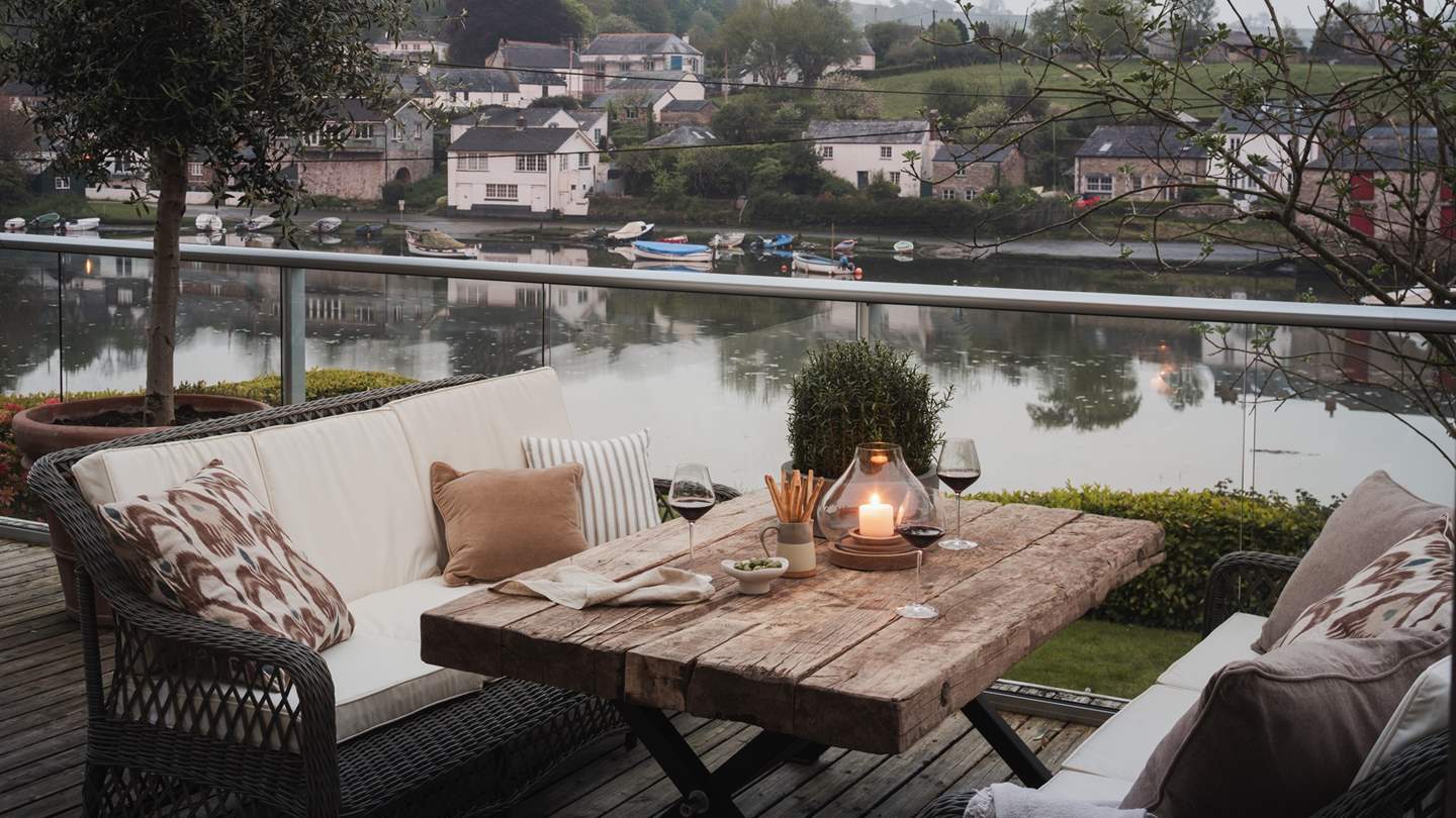 The first floor promises the best of outdoor living with a river-view sundeck
