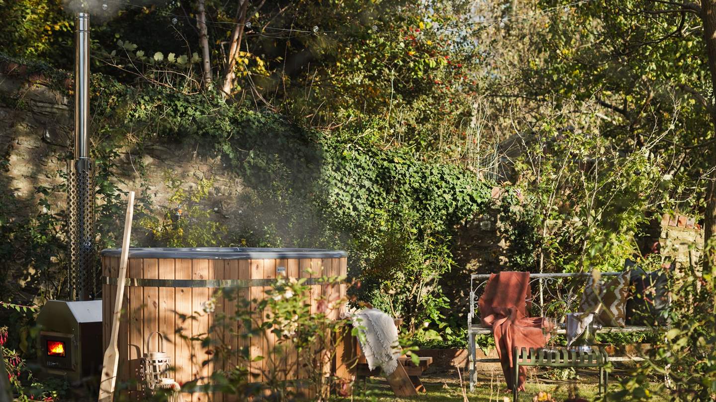 Take a heavenly soak in the wood-fired hot tub for two