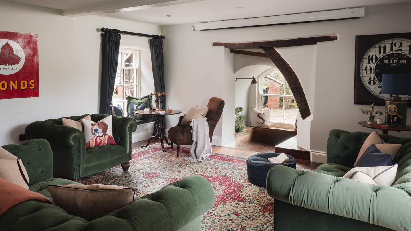 An idyllic space for relaxing in quiet moments or gathering over games, the wonderful entertainment room promises even more delight