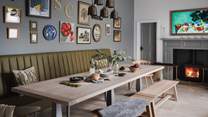 Blending into the dining area, the kitchen also has a wood dining table with space for all the family