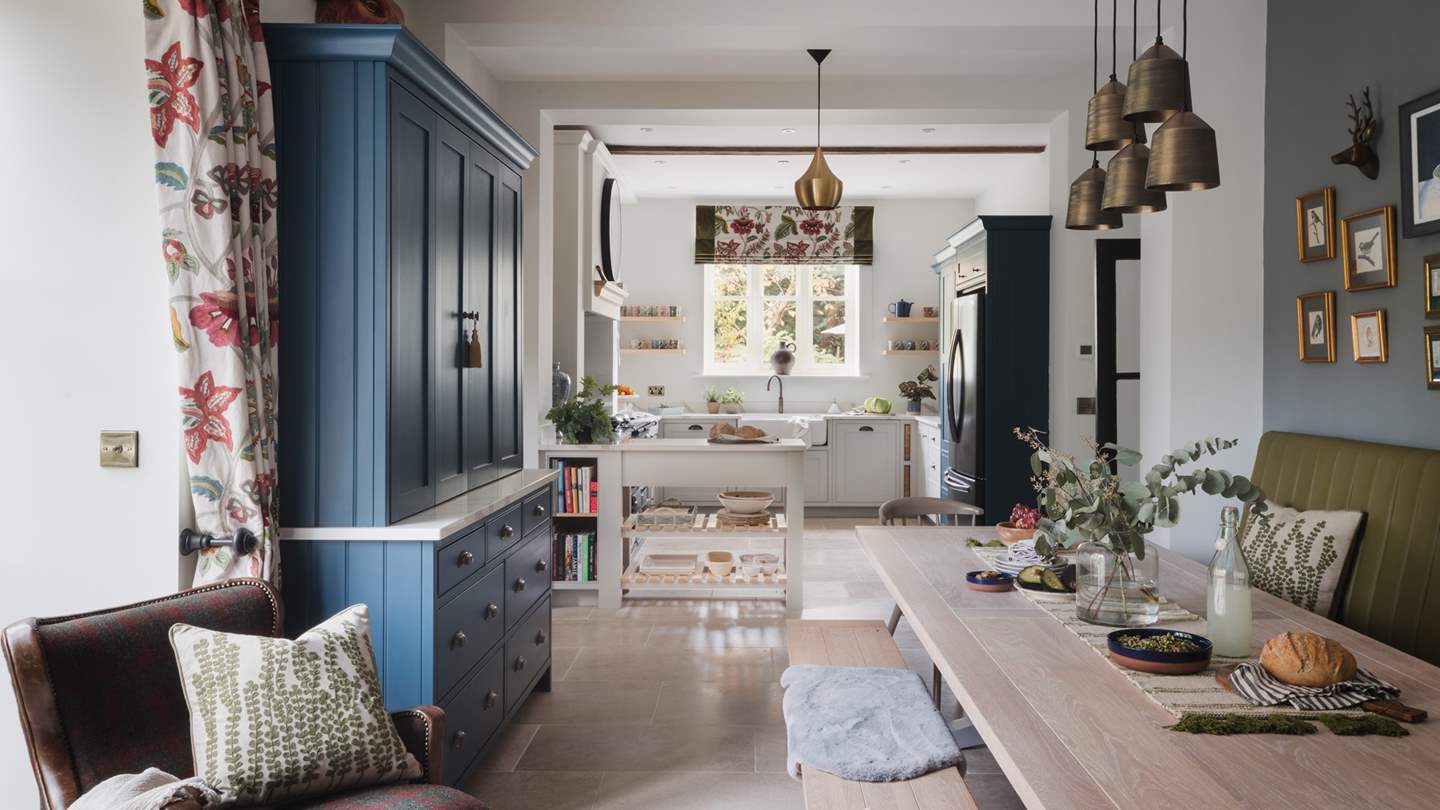 A light-filled space that connects with an adjoining dining area, this open-plan ensemble makes for a magnetic heart of the home