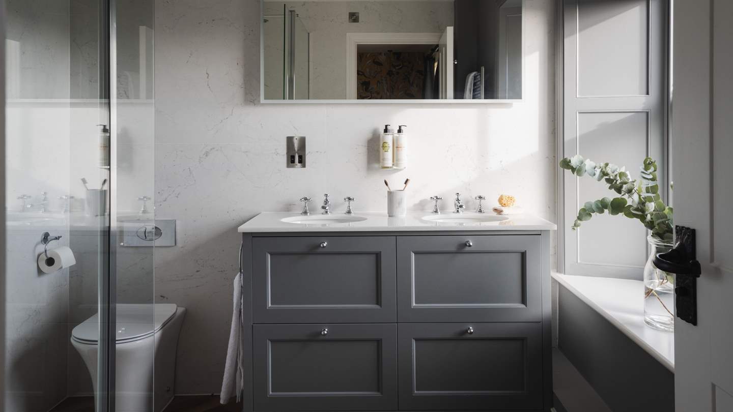 Ensuring the most relaxed mornings and evenings, an ensuite adjoins this bedroom, finished with a walk-in waterfall shower