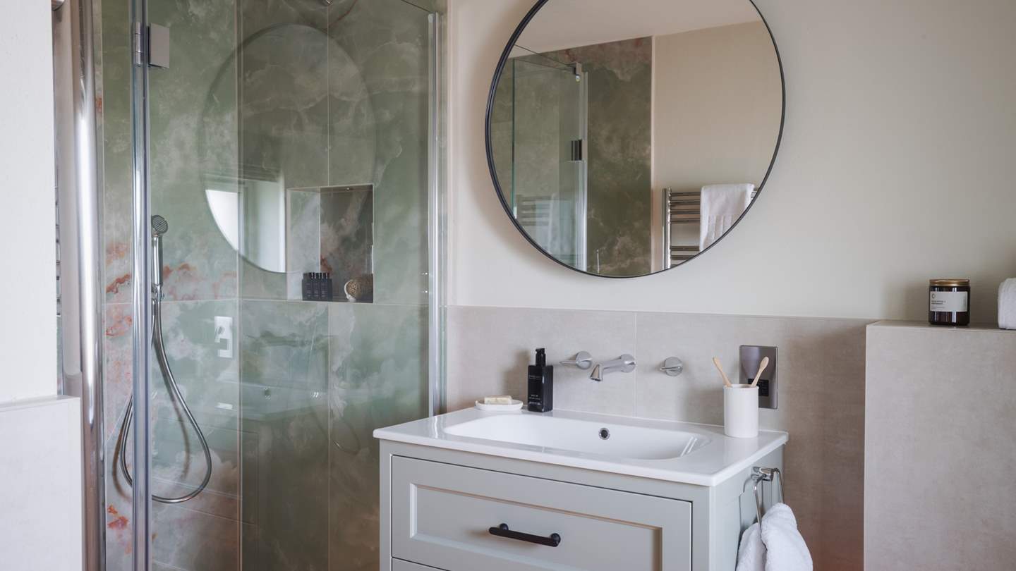 For comfort and privacy, this bedroom also benefits from its own ensuite bathroom with a shower and heated towel rail