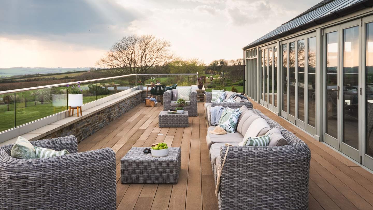 Step out to the decking area to savour far-reaching views across rolling countryside scenes