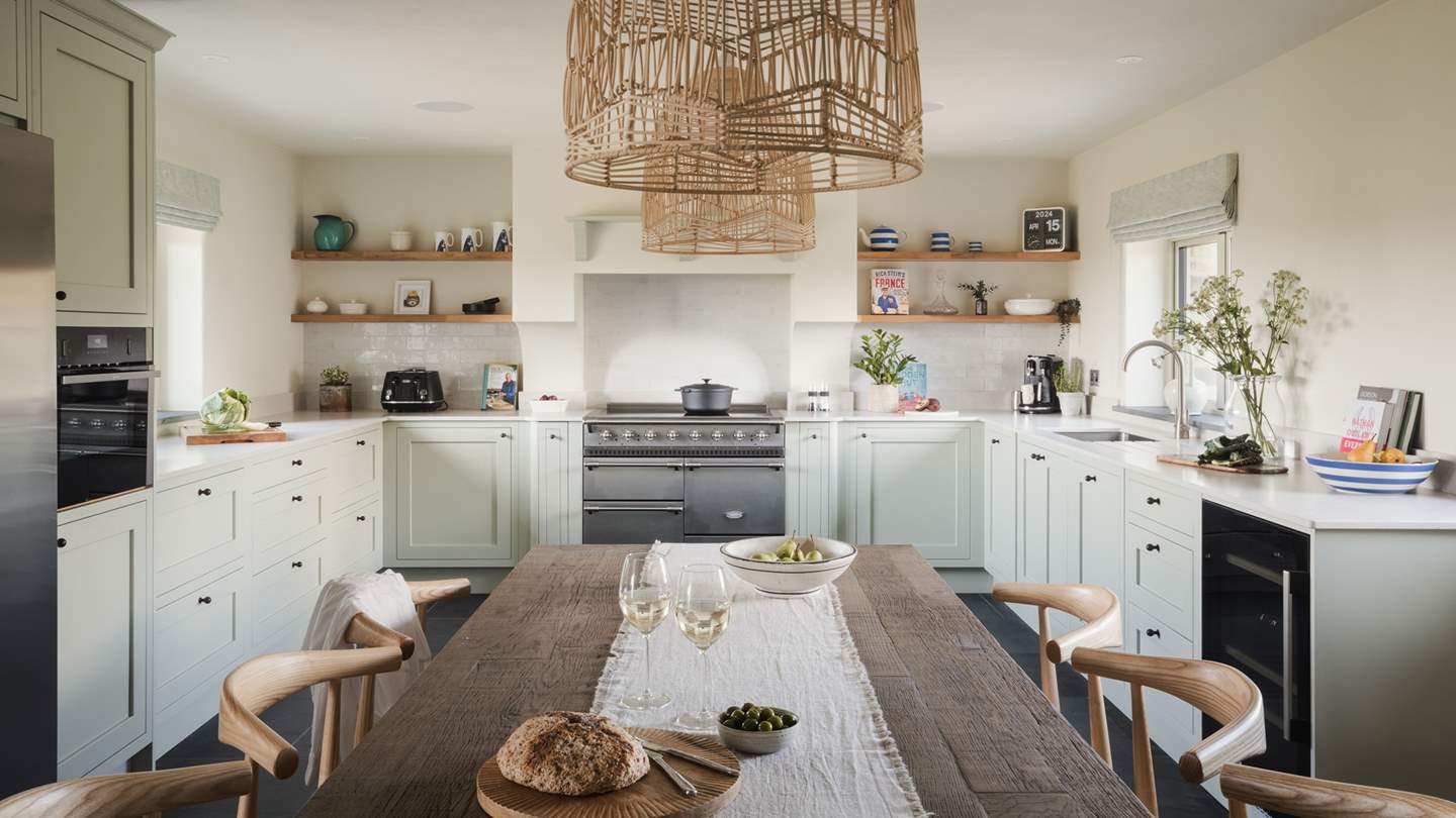 The beautiful heart of the home, Trevear New Cottage's kitchen lends itself perfectly to gathering and dining over delicious repasts