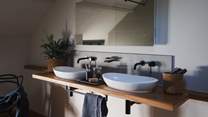 We just adore the gorgeous twin sinks