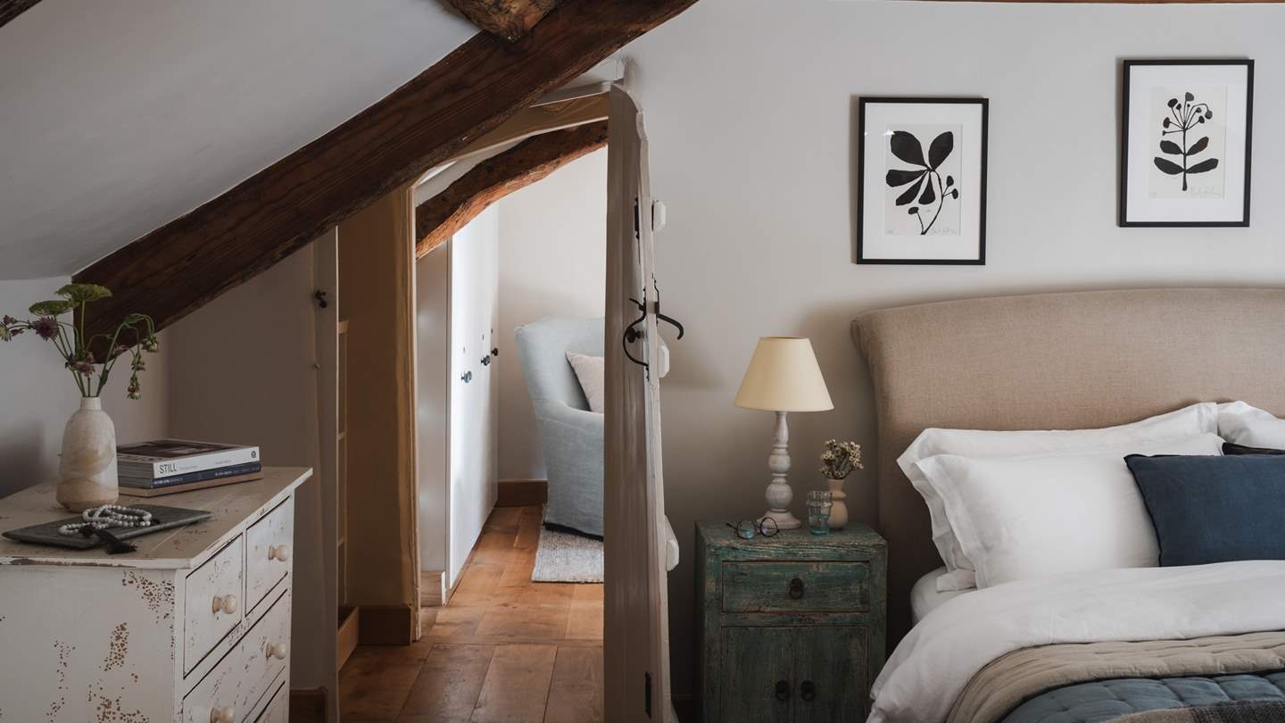 Through the quirky original door you'll find the darling reading room