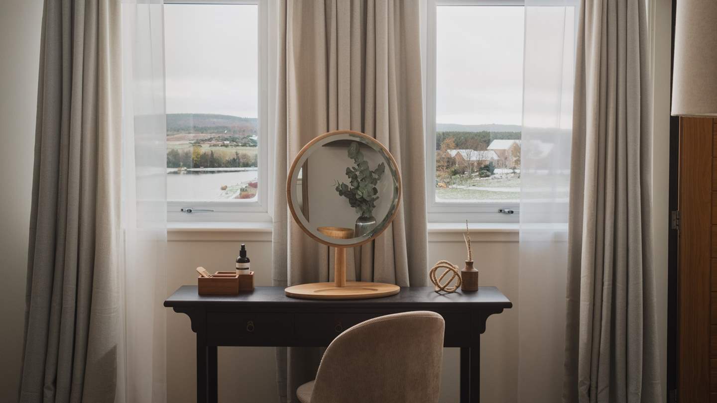 Look out to charming Scottish landscapes from both sides of this heavenly space 