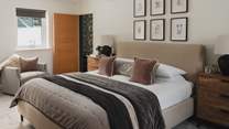 The sumptuous second bedroom benefits from a super-king bed and its very own dressing room... 