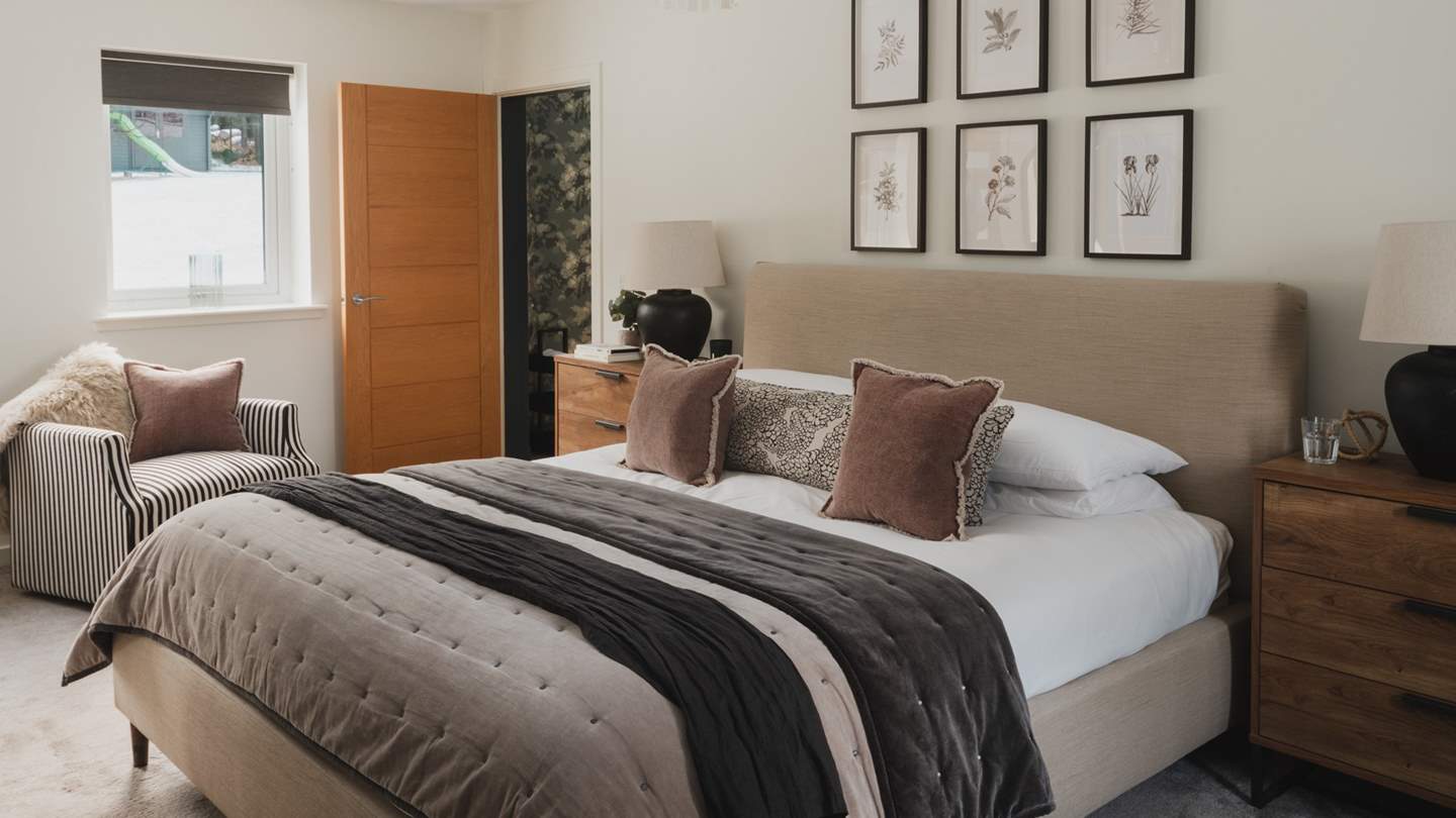 The sumptuous second bedroom benefits from a super-king bed and its very own dressing room... 
