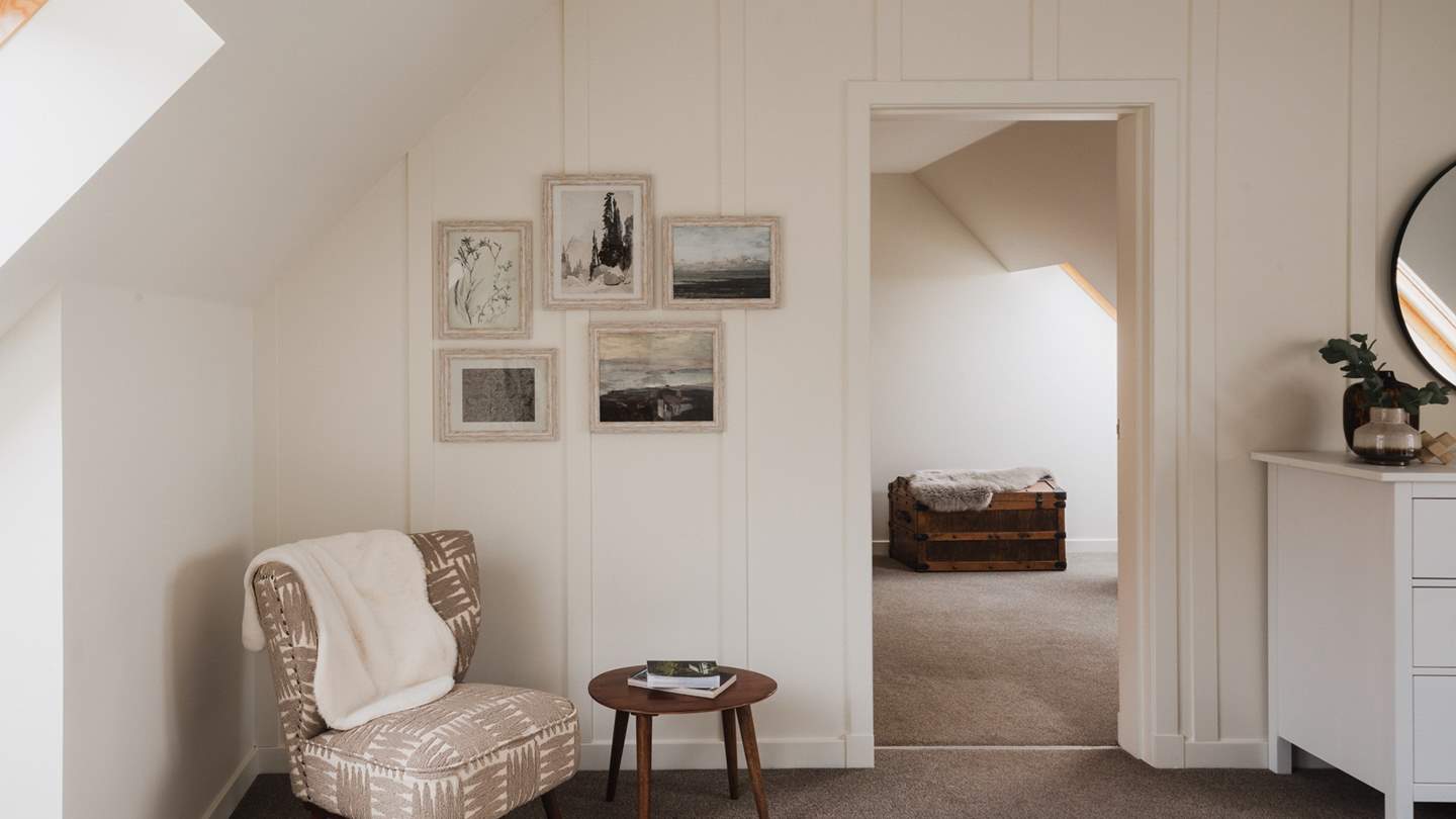 We adore the combination of vintage artwork and pretty prints in this space