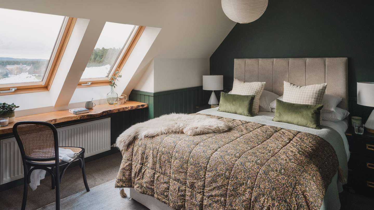 Jewel greens reign in the fourth bedroom with a king size bed...