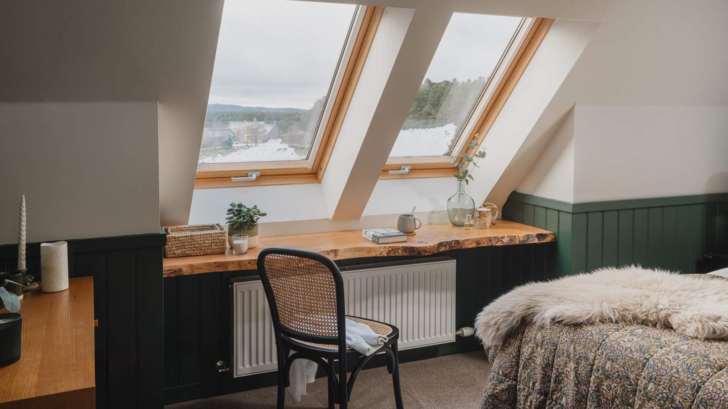 Admire woodland vistas from the bespoke, feature wood shelf, sourced from nearby Logie Timber