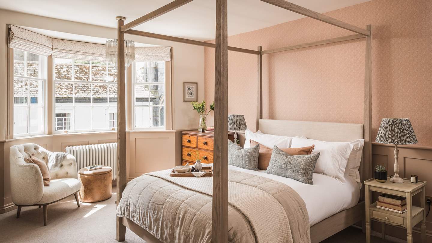 The second bedroom, also with an impressive bay window, is seriously romantic...