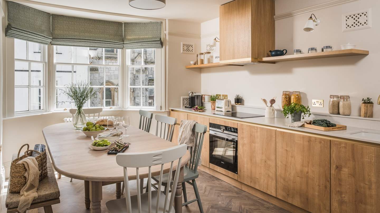 Within the kitchen lies the dining table from Neptune, easily seating eight, it’s perfect for laid-back meals and celebratory dinner parties alike