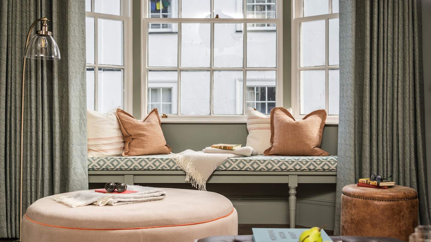 Arina’s incredible sitting room, located off the main entrance hall with beautiful original feature fireplace, is a wonderful space to spend time together in