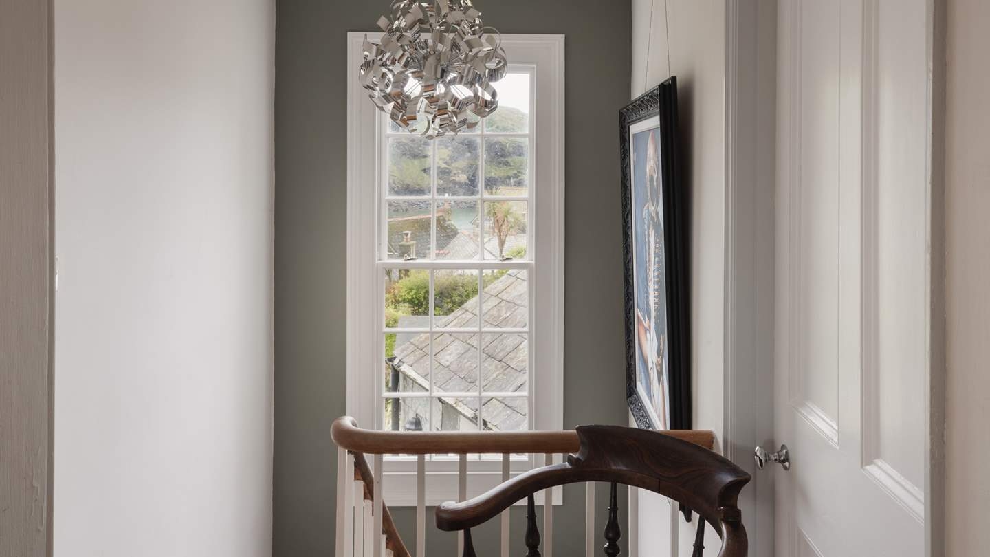 Take the feature staircase to the first floor...