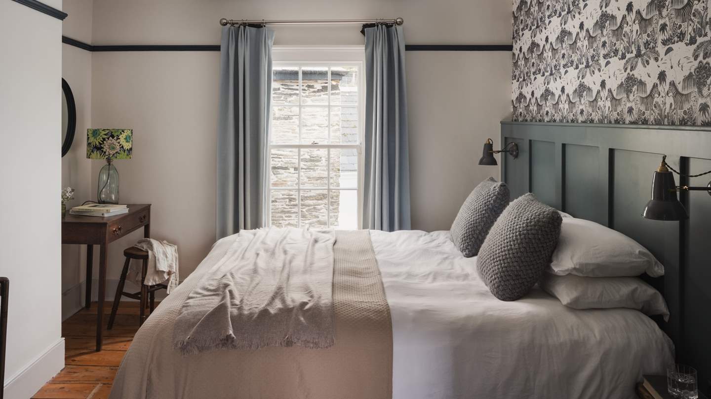 Calling for nights of peaceful slumber, a zip-and-link super king size bed lies in the second bedroom