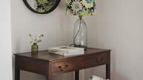 A dressing table and reading chair for moments of calm