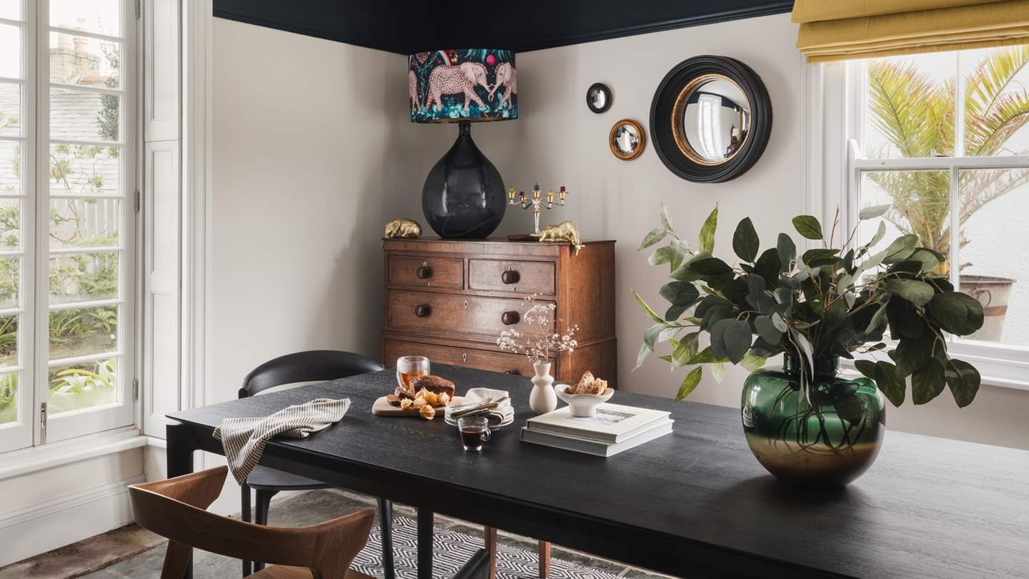 Lending further ambience and mood lighting are a Kartell and two Liberty of London lamps with bespoke Emma Shipley shades