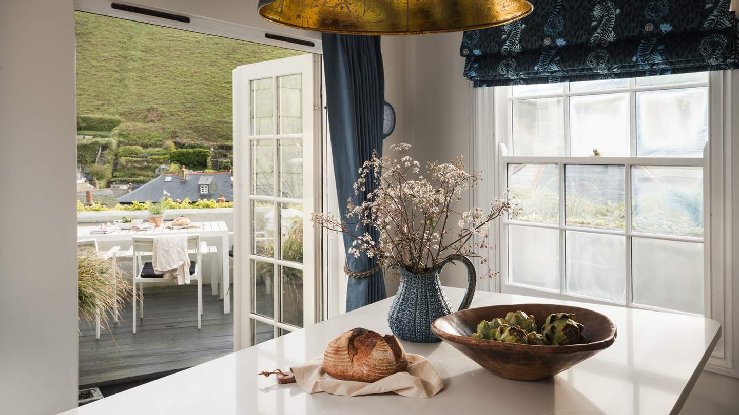 Gather together for champagne and charcuterie around the island - a toast to magic moments