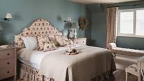 There are four beautiful bedrooms on the first floor, each with their own distinctive style