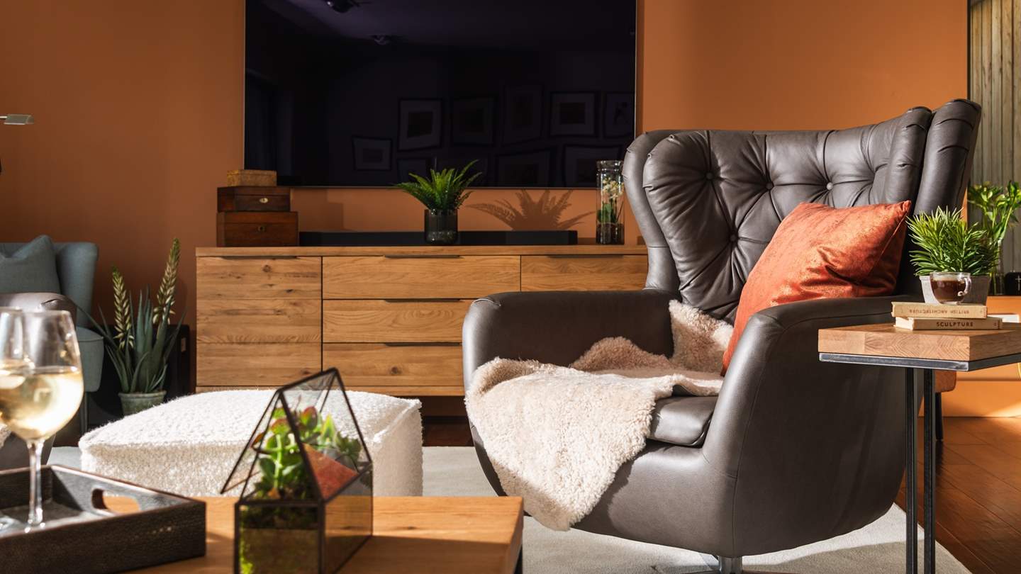 Relish relaxed moments in front of the television, with a large cinema-style screen and Meridian Audio sound system 