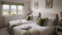 The Coppice's second bedroom paints a picture of total calm