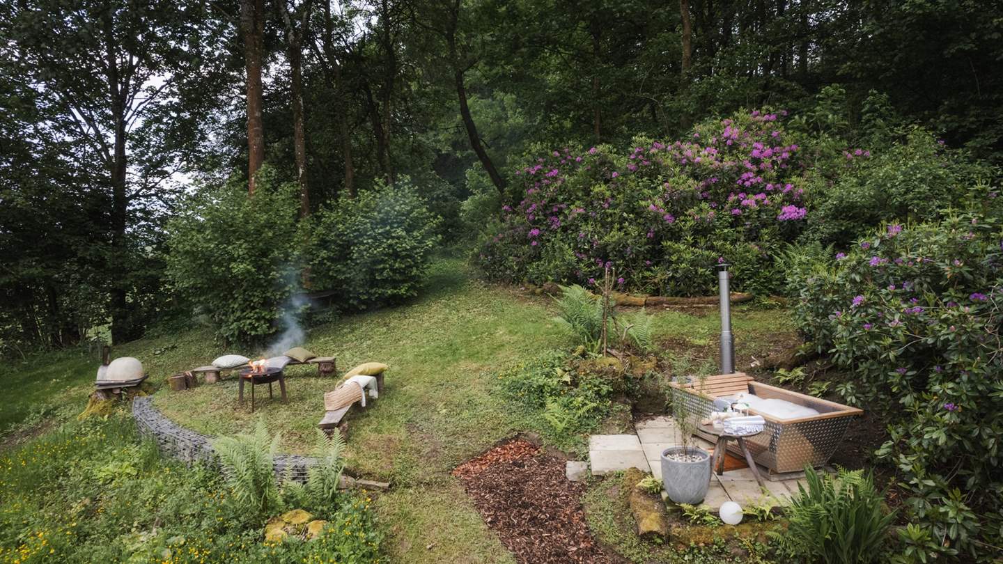 You'll also find a fire pit for gathering around post sun-down