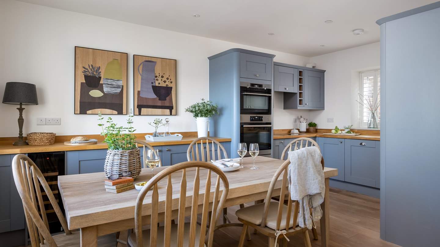 A handsome space harmonising with the coastal views beyond, the kitchen is a dream for crafting delicious dishes