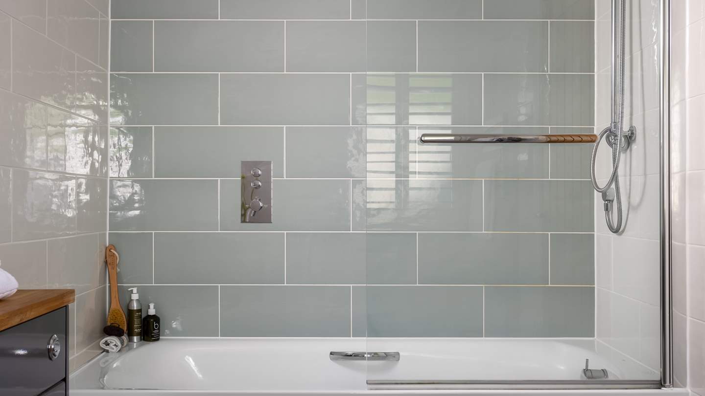 Shades of pale blue ensure a heavenly space for self care