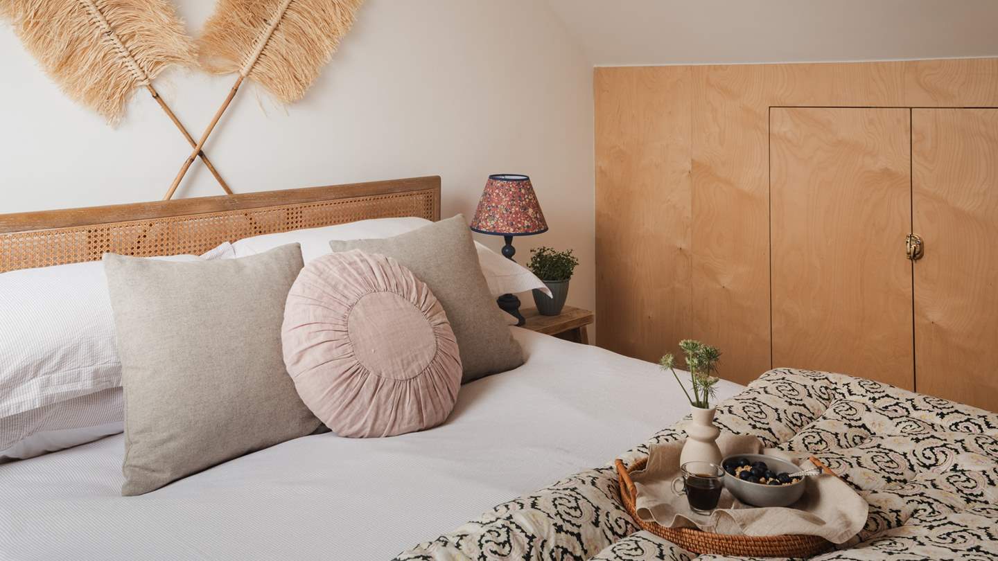 This calming space boasts Velux windows and a soothing colour palette with pink inflections